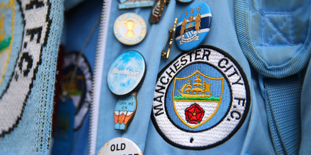 Manchester City announce badge debate