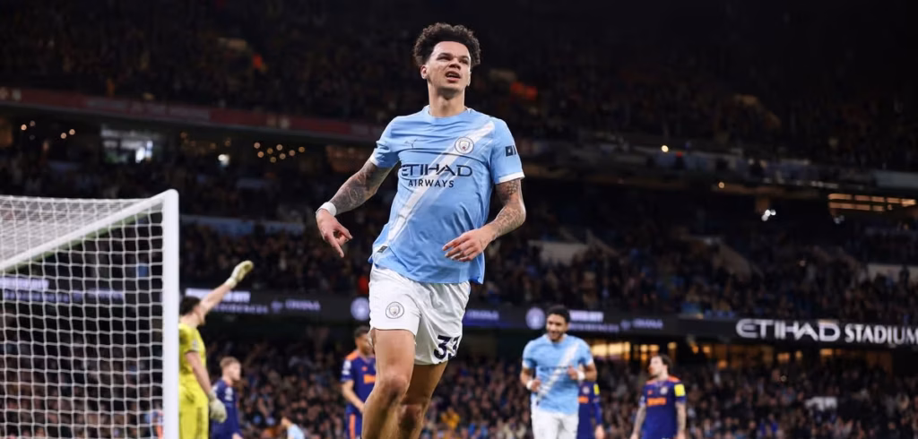 Manchester City move within two points of Arsenal after Nico O’Reilly masterclass
