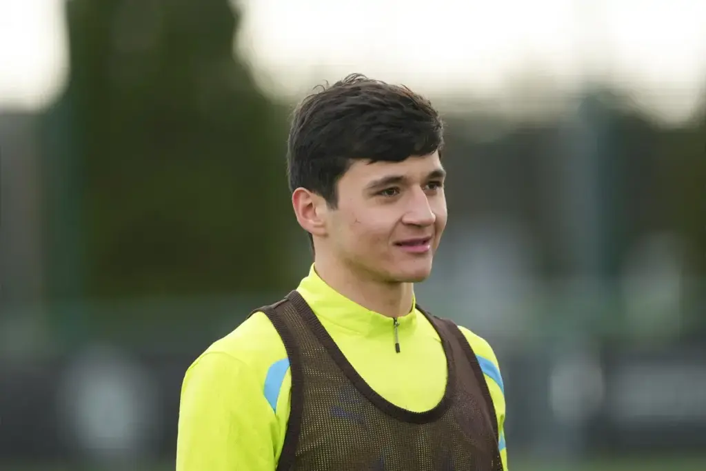 Man City duo Abdukodir Khusanov and Antoine Semenyo in action during Monday international fixtures
