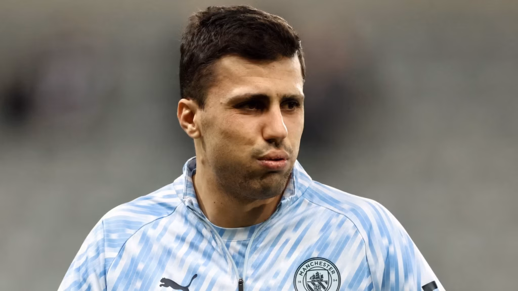 Rodri Man City charges: Rodri wearing a Manchester City jacket