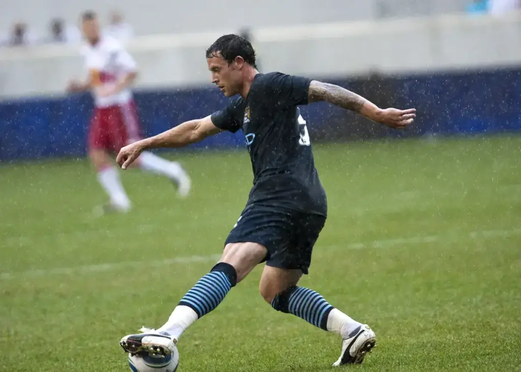 Ex-Chelsea star Wayne Bridge joins in with Man City celebrations after Stamford Bridge triumph