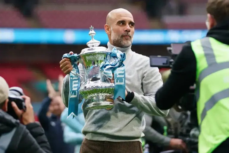 Pep Guardiola curbs Man City celebrations after FA Cup triumph